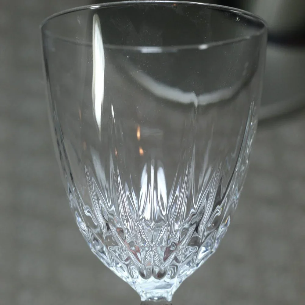 Elegant set of two stemmed cut glass wine glasses